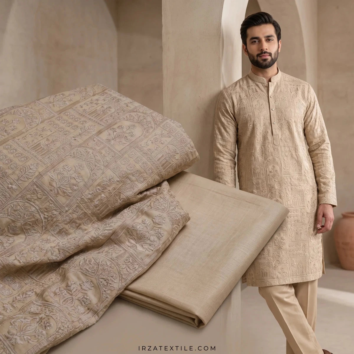 Close-up of Mehraab Beige unstitched fabric by Irza Textile, featuring intricate traditional embroidered patterns on the kurta piece alongside matching plain trouser fabric.